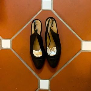 Pair of CHANEL sling back black leather shoes